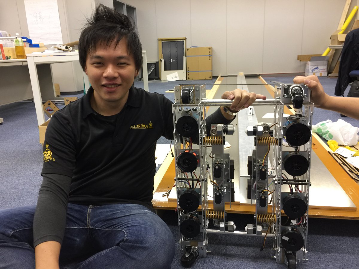 Andrew Lee with a Hyperloop pod prototype